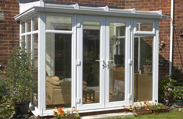 White uPVC lean-to conservatory attached to a brick property