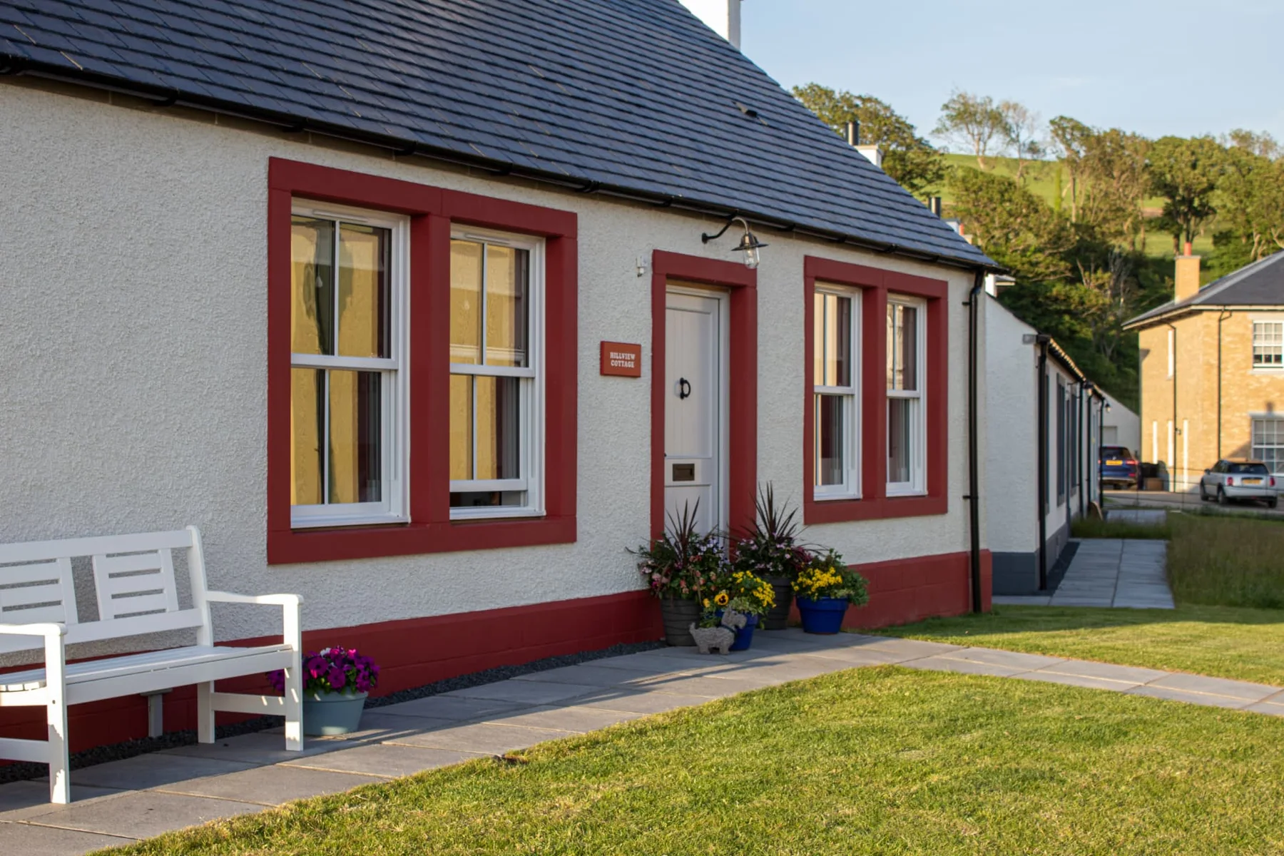White sash windows on a traditional single-storey home