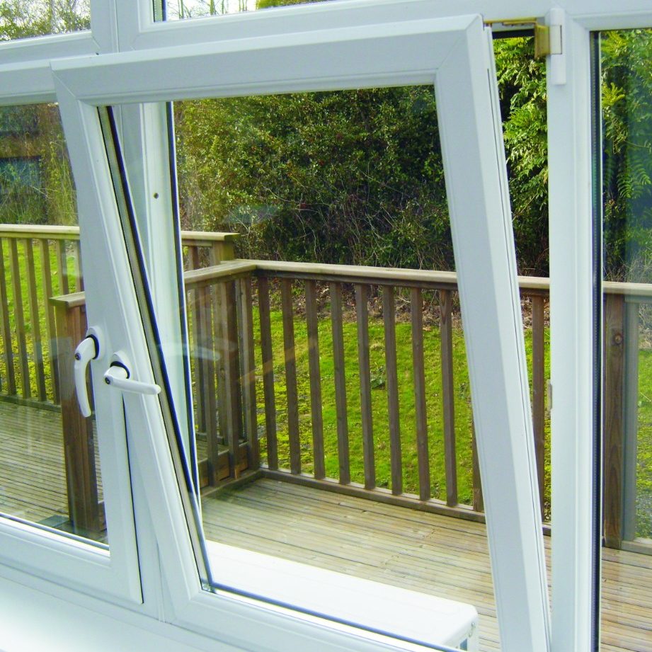 White uPVC tilt and turn window open inwards