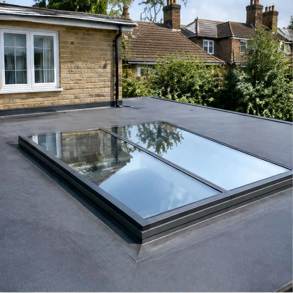 Flat linked glass skylights installed at a traditional brick home in natural daylight