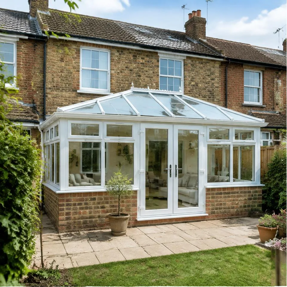 Edwardian conservatories installed at a traditional brick home in natural daylight