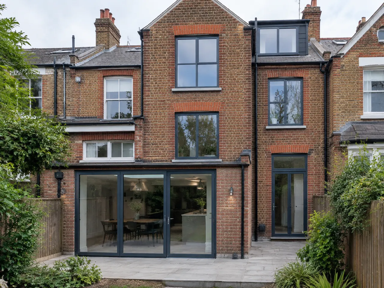Anthracite grey aluminium windows on a Victorian terraced house rear elevation