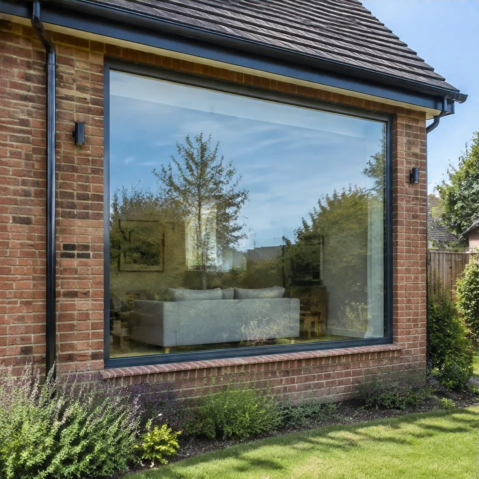 Fixed and custom windows installed at a 1930s semi-detached home in natural daylight