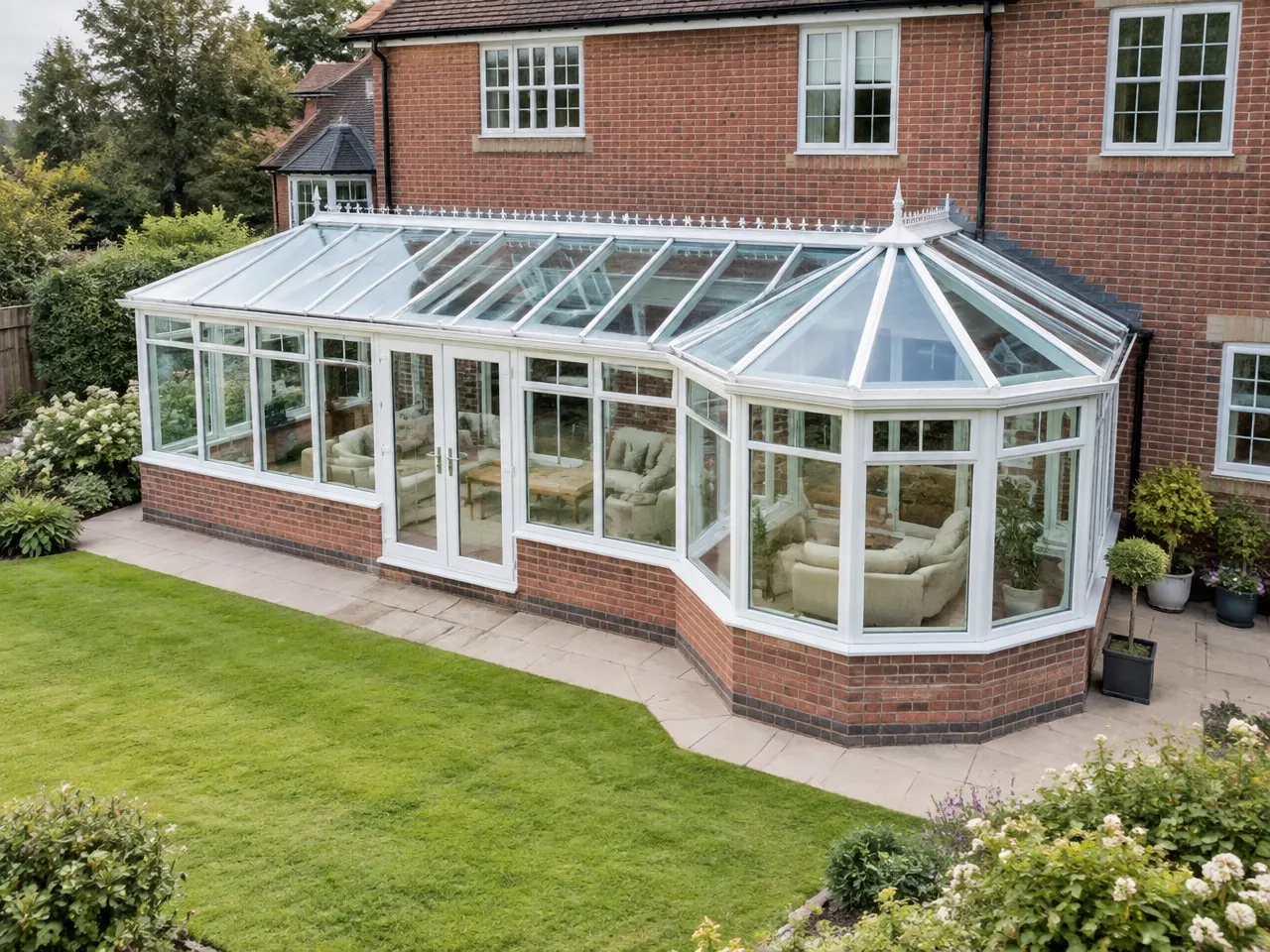 P-shaped white conservatory with garden view
